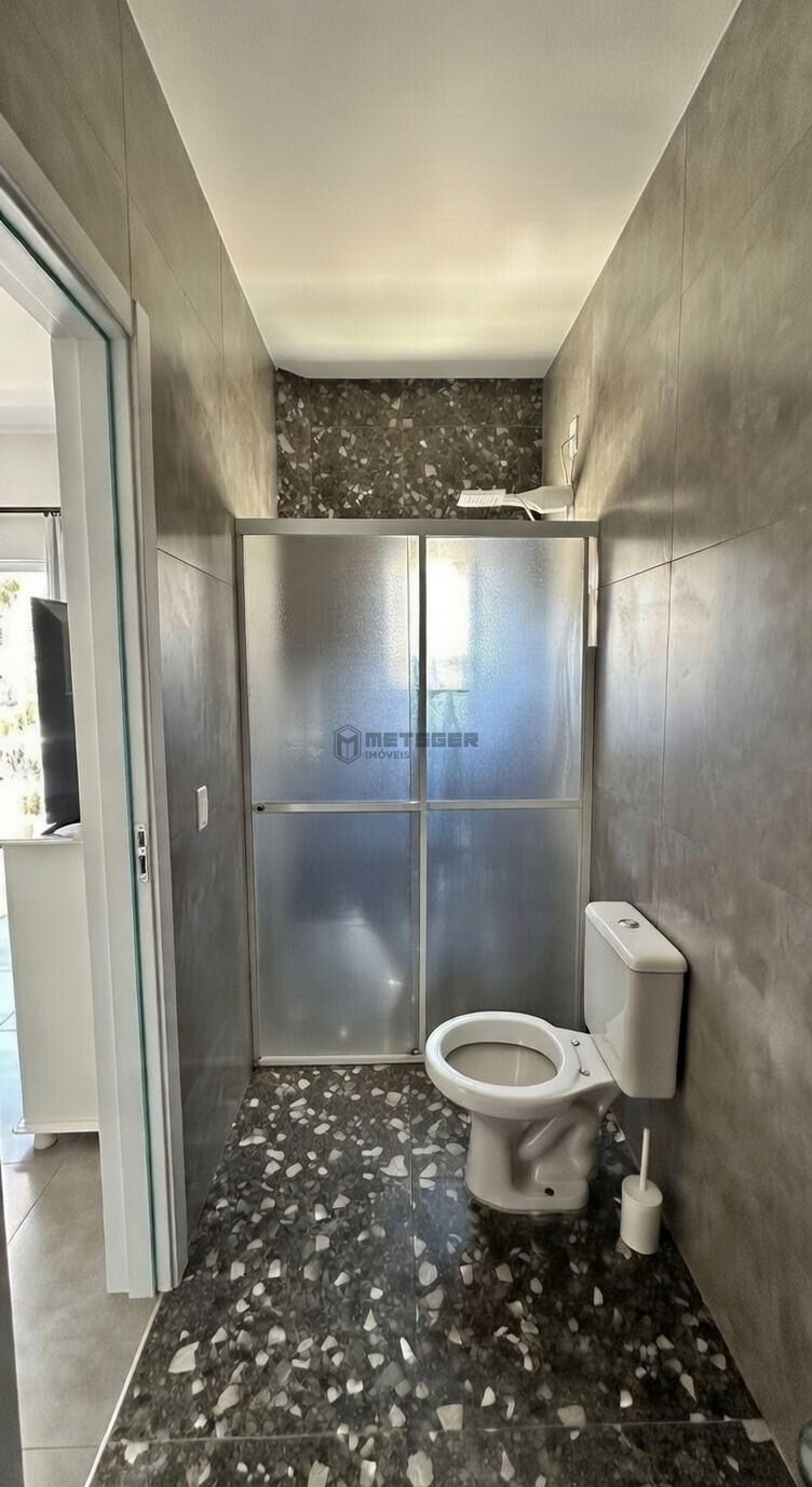 Casa com piscina e 4 suítes no centro de Balneário Camboriú