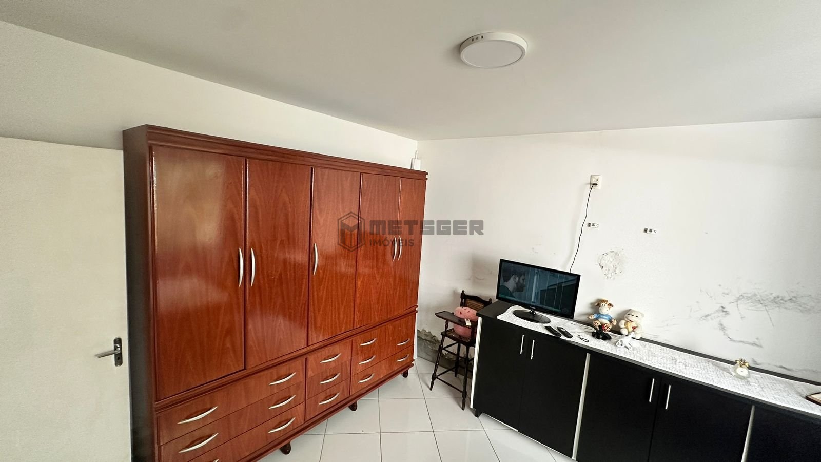 Casa com piscina e 4 suítes no centro de Balneário Camboriú